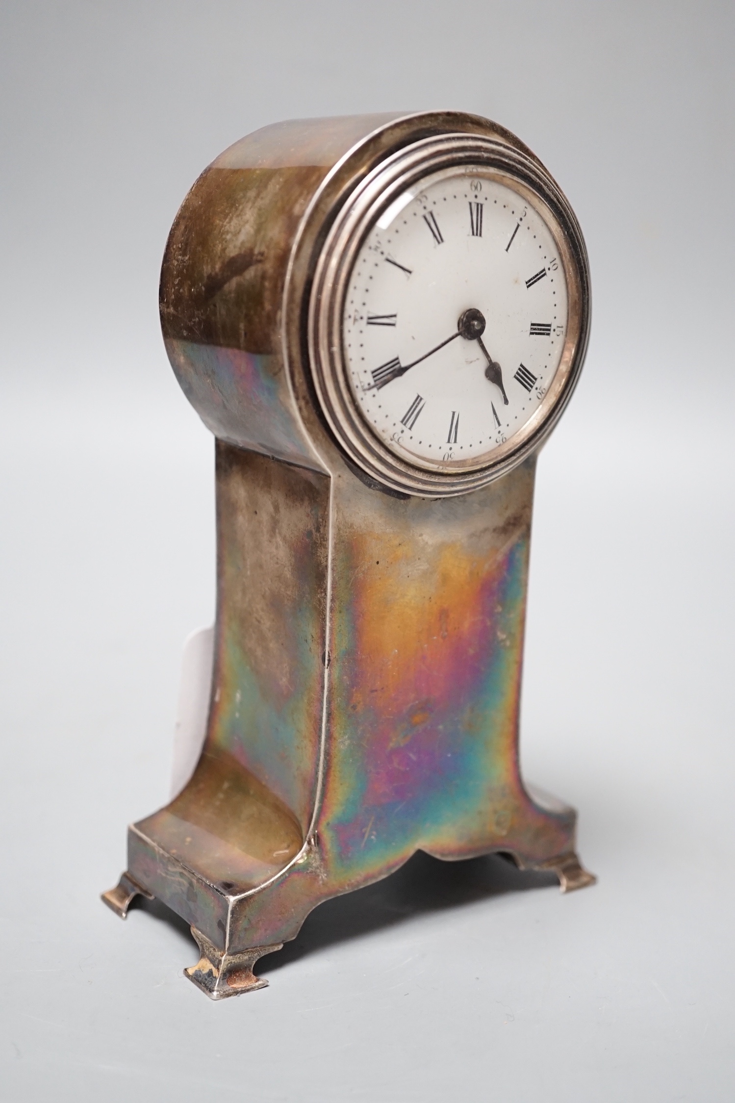 A George V silver mounted balloon cased timepiece, Birmingham, 1910, 17cm.